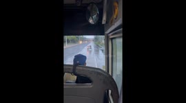 Ghost rider appears to drive tuktuk through rain