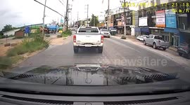 Driver strays out of lane and clips oncoming truck