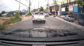 Driver strays out of lane and clips oncoming truck