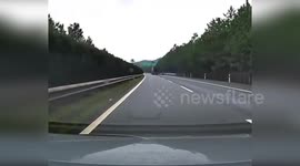 China: Flying Truck Tire Leaps Over Highway Barrier Smashes Car In Violent Collision