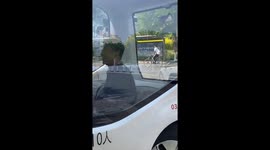 Locals board self-driving bus in China