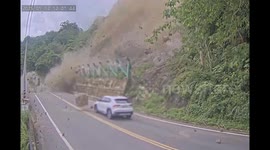 Closer call as huge boulders crash down mountain, striking passing vehicles in Taiwan