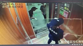 Bungling delivery workers smash panel of glass in lift door