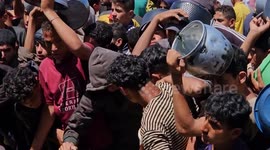 Hot meals distributed to Palestinians as Israel lets limited aid into Gaza