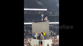 Tottenham Hotspur Fans Climb Screens Following Europa League Win
