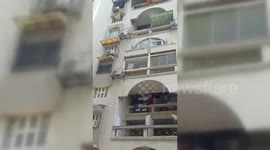 India: India: Blaze in Ahmedabad Tower Following AC and Gas Cylinder Explosions