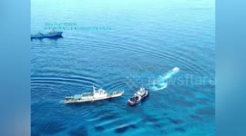 China Coast Guard fires water cannon at Philippine ship