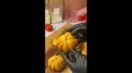 Girl bakes pumpkin-shaped pizzas to bring Halloween vibes to the table