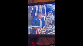 Sneaky shoplifter's not-so-subtle attempt to hide stolen shirt hilariously caught on CCTV