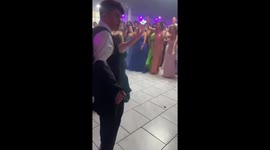 Woman falls during dance move at party in Plainview, Texas, USA