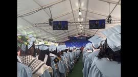 US: Students boo acting President Claire Shipman during the graduation ceremony