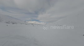 Competitor Crashes At Snowmachine Hill Climb