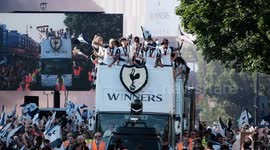 Thousands turn out for Tottenham Hotspur celebratory open top bus parade outside home ground White Hart Lane