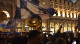 Italy: Napoli fans celebrate Serie A title in Milan's Duomo square