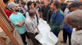 Palestinians bid farewell to loved ones killed in Israeli strike