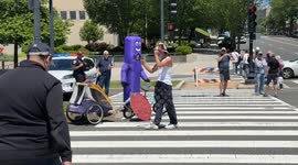 Man dresses up as a wacky wavy inflatable tube man to make smiles happen