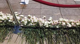 Visitors Place Flowers at Tomb of the Unknown Soldier