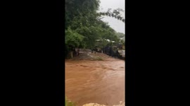 Heavy rain triggers floods in northern Thailand