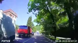Lorry with failed brakes rams into eight cars before being stopped by dump truck