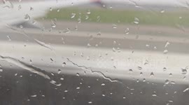 In Bangalore, South India Heavy rains to flight movement to runway beautiful weather flying view about clouds & rain