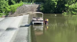 Firefighters save boat trippers stuck next to dam in Indianapolis