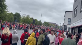 Liverpool FC fans line city streets for 20th league title celebration bus parade