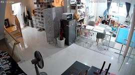 Woman slips on door mat and crushes laundry basket in Bangkok, Thailand