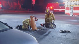 US, Los Angeles: Pacoima Man Rescued From Manhole