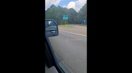 Bumper Hanging by a Rope on I-64