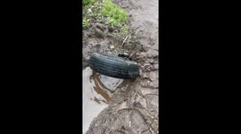 Tire And Chain Used To Clean Drainage Pipe