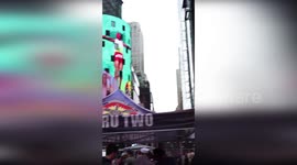 US: Navy Diver Plays Tic Tac Toe Underwater In Times Square During Dramatic Fleet Week 2025 Display
