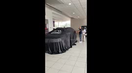 Man Uncovers Car and Accidentally Covers Little Girl with Sheet