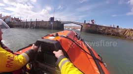 RNLI treats family rescued from choppy sea by surfer in Scotland