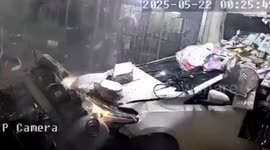 Shopkeeper cheats death as he leaps away from car hurtling into shop