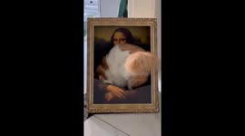 Pet cat lounges on Mona Lisa-themed bed
