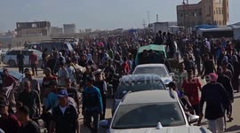 Thousands of Palestinians flock to aid distribution point in southern Gaza