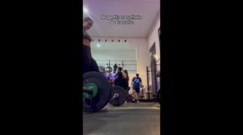 Weightlifter Drops Barbell on Her Back