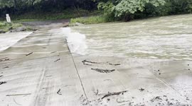 Flash Flooding in Chester, AR covers bridge