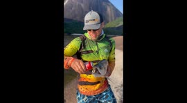 Fanged Fish Bites Into Soda Can