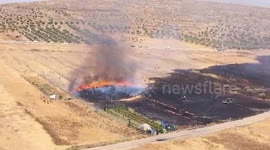 Armed Settlers Raid Palestinian Village