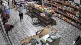Grandmother takes a tumble as she stumbles into shop
