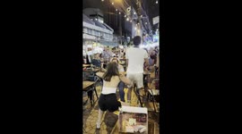 Singer leads tourists on pre-drinks workout with aerobics moves