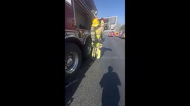 Dramatic moment fire fighter escape from building explosion