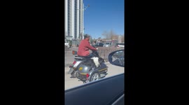 Grandmother takes her pet dog in motorcycle sidecar