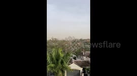 Australia: A dust storm from SA turns the Sydney skyline yellow