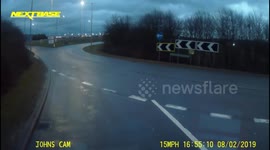 Car joining a roundabout the wrong way at Stansted airport