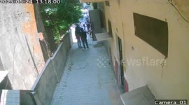 Elderly woman uses cane to chase away gun-wielding suspect