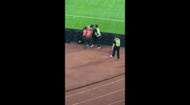 Fan runs onto field to meet Ronaldinho Gaúcho in Tbilisi, Georgia