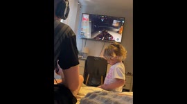 Toddler turns off TV during father's game in Pontefract, England, UK