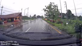 Pickup truck spins out-of-control and crashes on wet road